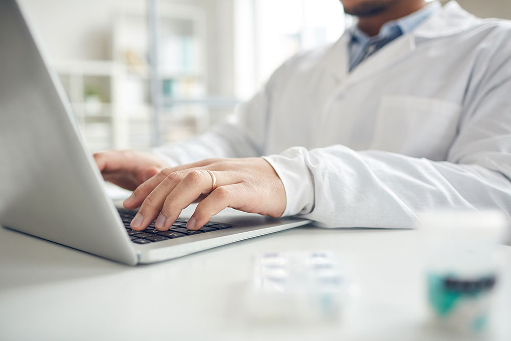 Doctor-using-laptop